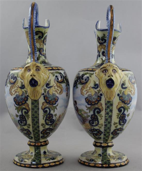 A pair of French faience ewers, late 19th / early 20th century 30cm